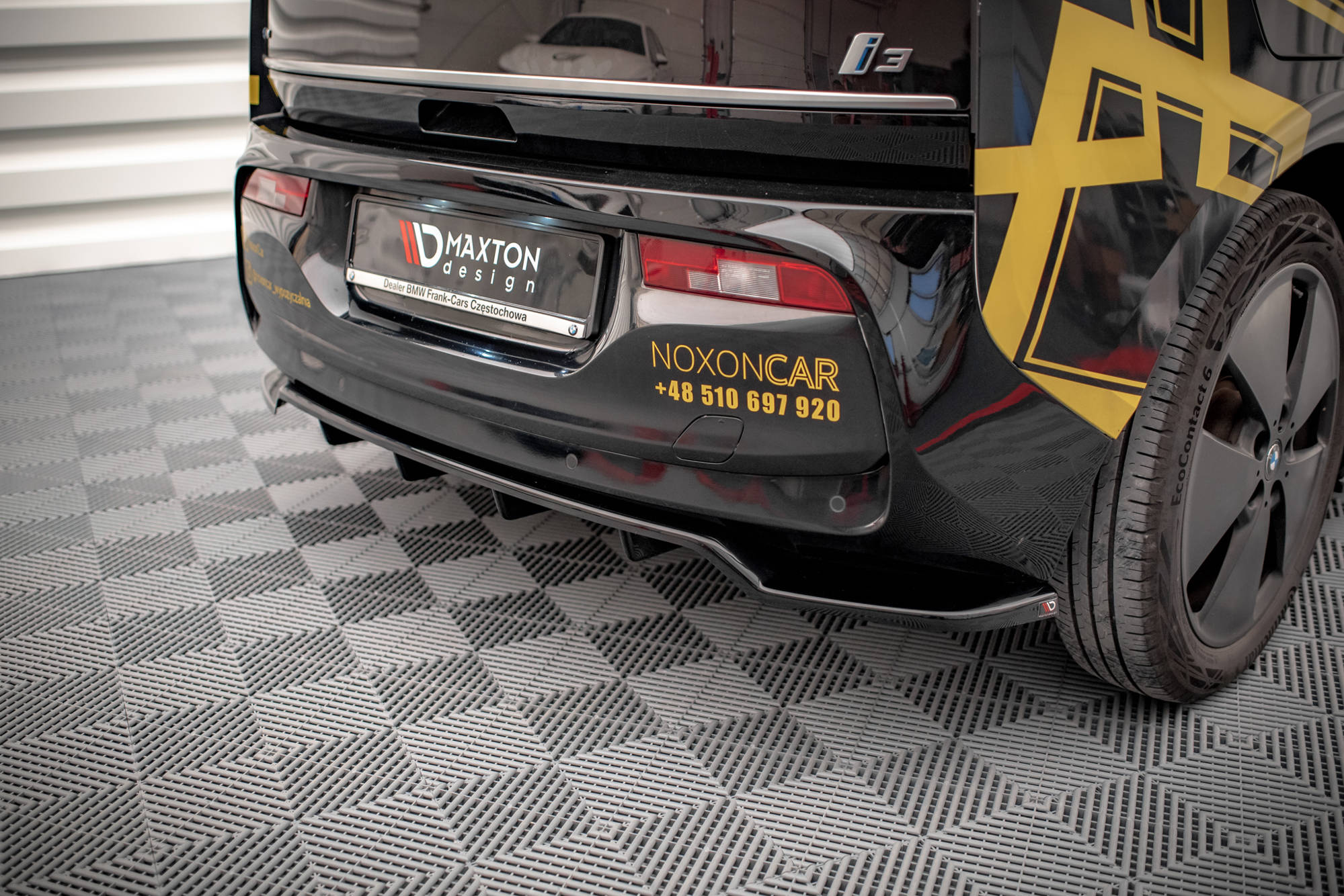 Maxton Design Street+ Mittlerer Diffusor RACE passend für BMW i3 S Mk1 Facelift schwarz Hochglanz