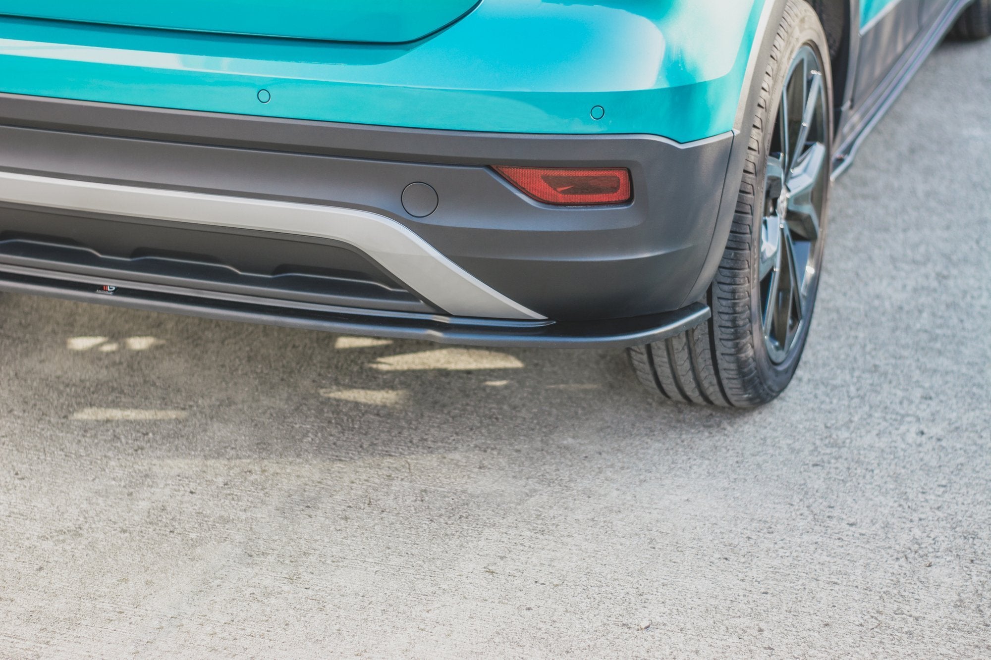 Maxton Design Mittlerer Diffusor Heck Ansatz für Volkswagen T-Cross schwarz matt