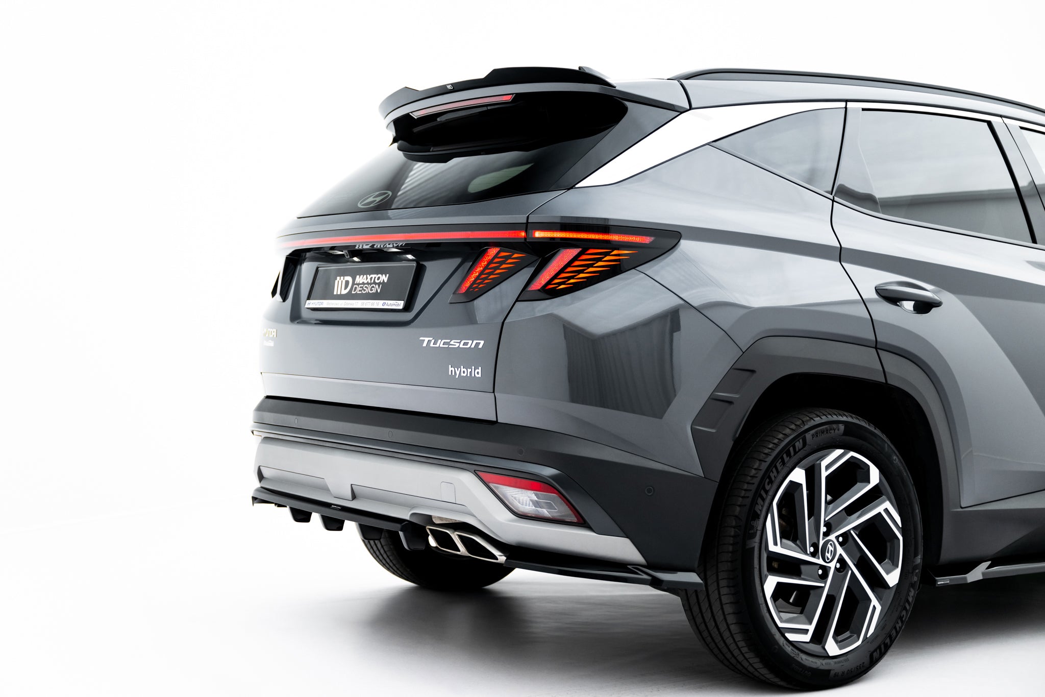 Maxton Design Street+ Mittlerer Diffusor RACE passend für Hyundai Tucson Mk4 Facelift schwarz Hochglanz