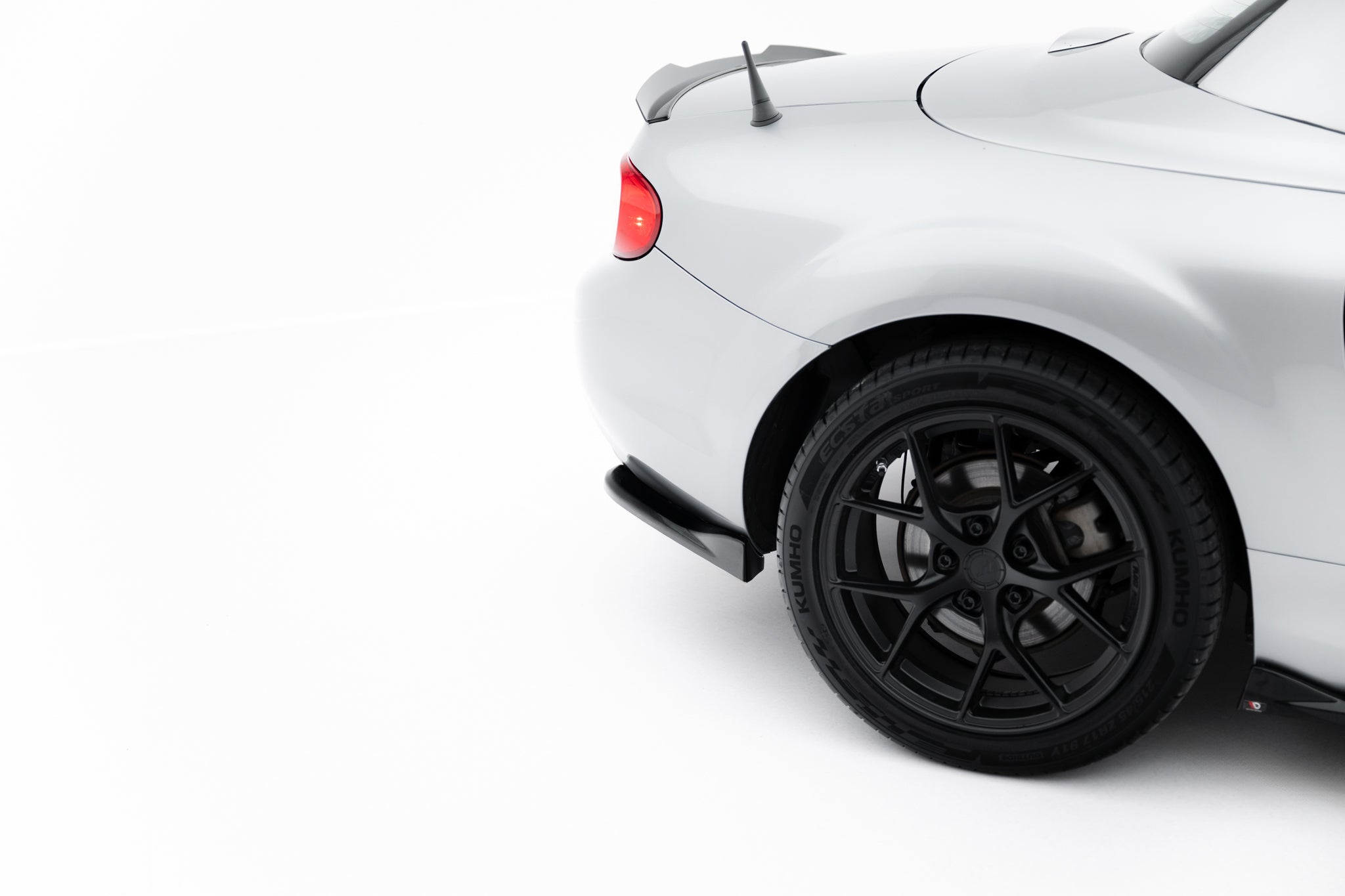 Maxton Design Heck Ansatz Flaps Diffusor passend für Mazda MX-5 Mk3 (NC) Facelift schwarz Hochglanz
