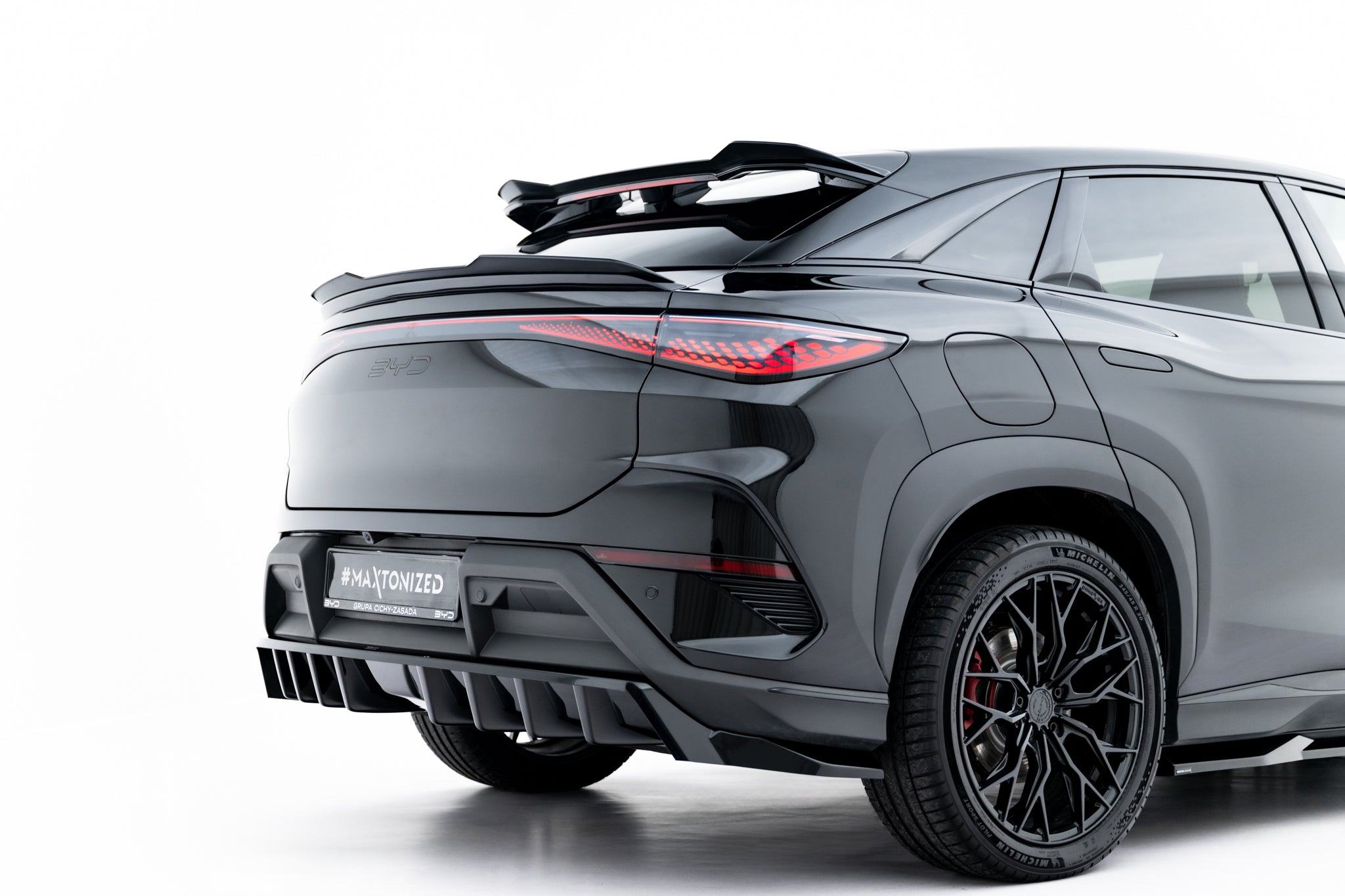 Maxton Design Niedriger Spoiler CAP passend für BYD Sealion 7 Mk1 schwarz Hochglanz