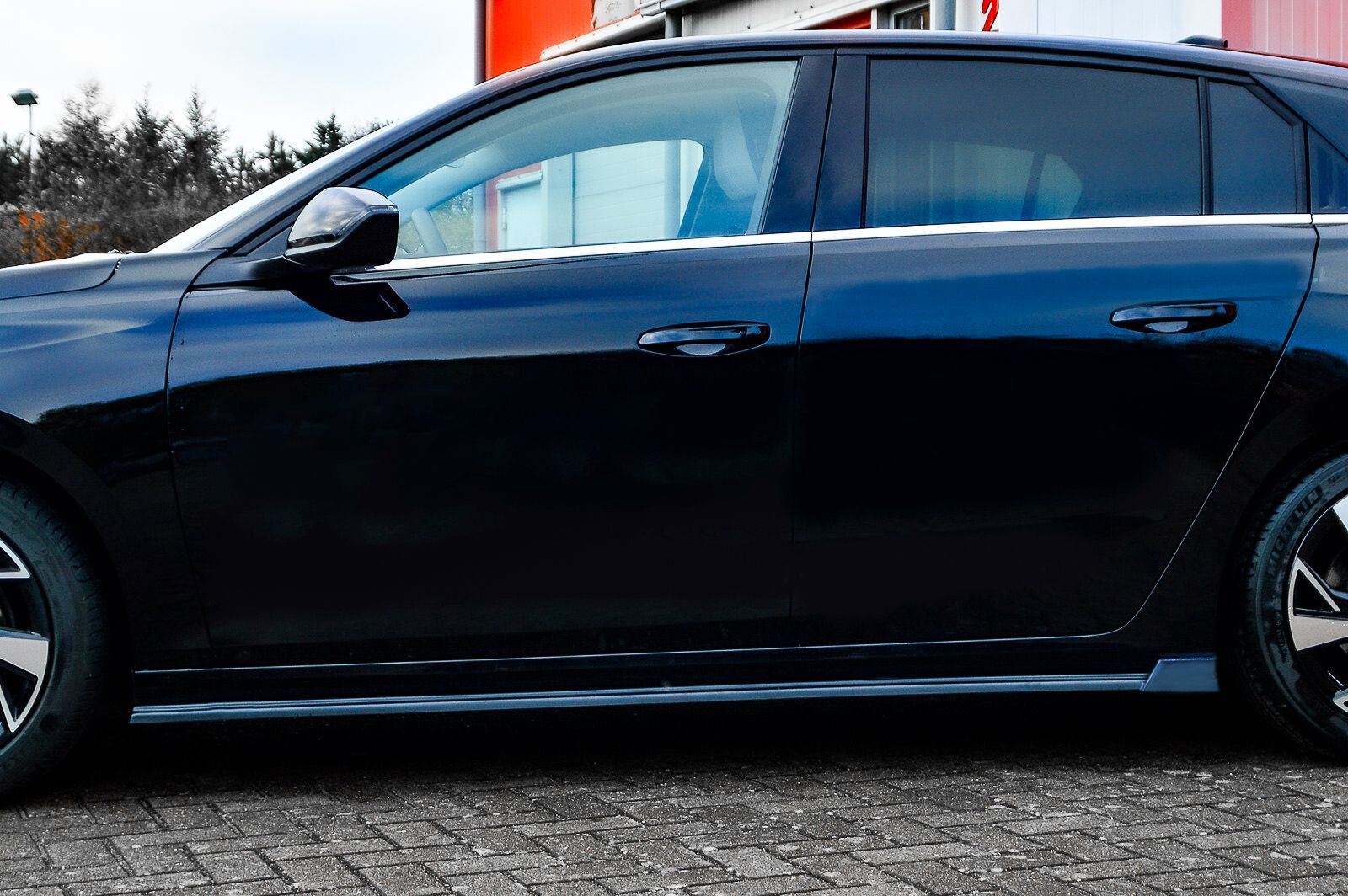 CUP Seitenschweller aus ABS mit Wing hinten für Opel Astra L