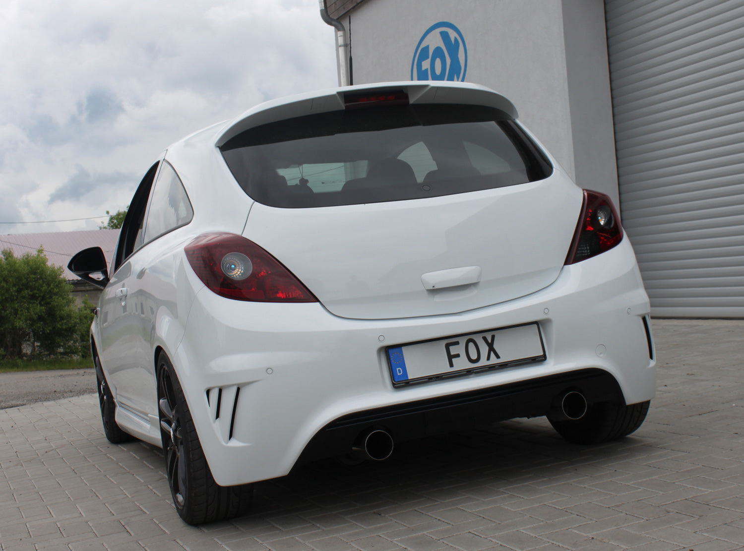 Fox passend für Opel Corsa D - NRE-Edition Stoßstange Endschalldämpfer Ausgang rechts/links - 1x100 Typ 14 rechts/links