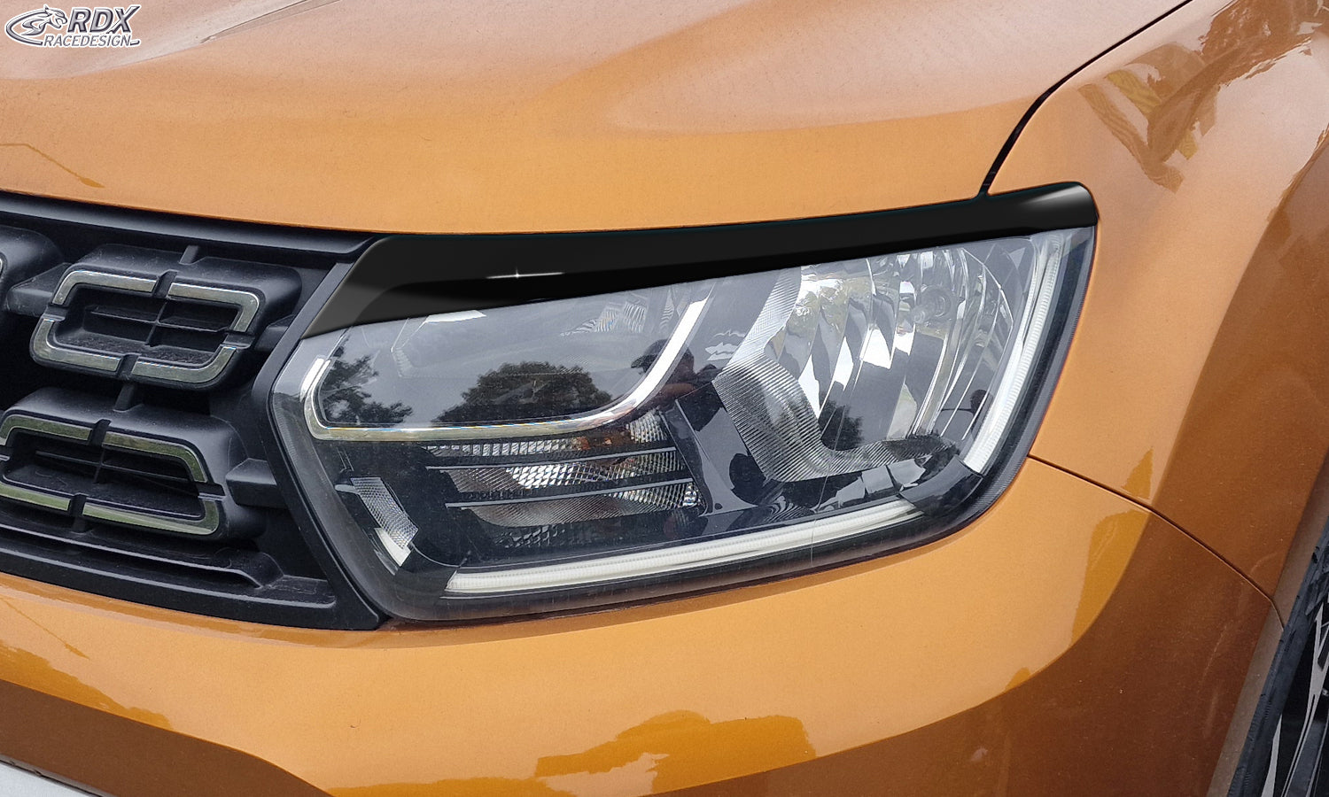 RDX Scheinwerferblenden für DACIA Duster II SR (Mod. 2018-2024) schwarz glänzend Böser Blick
