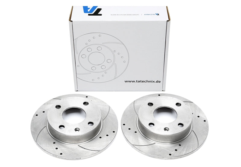 TA Technix Sport Bremsscheiben Satz Vorderachse gelocht + geschlitzt für Ford Ecort V+VI / Fiesta III / Courier Kasten / Orion